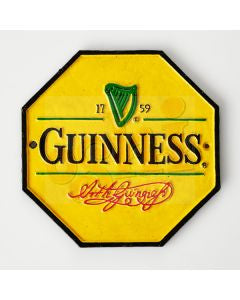 Yellow Guinness wall plaque - cast iron hex